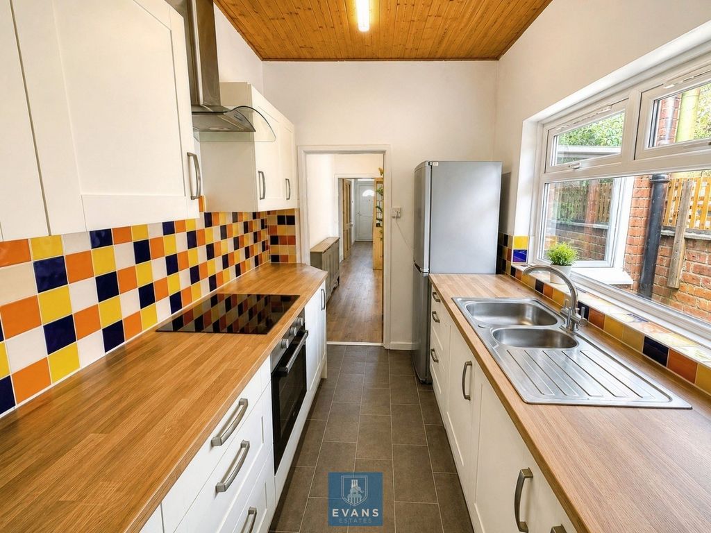Property photo 2 of 12 Kitchen