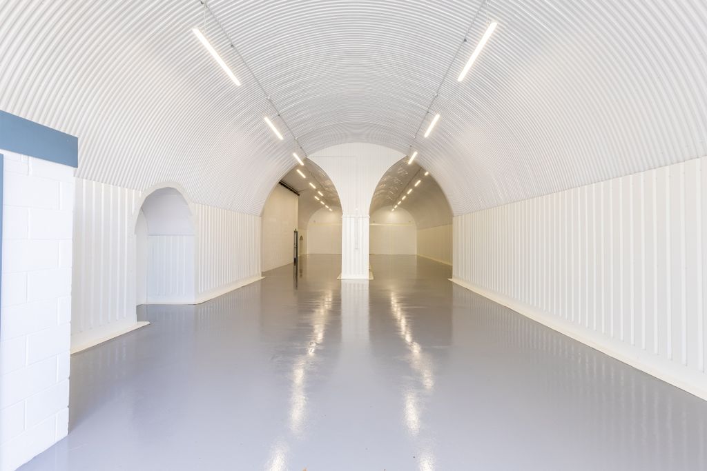 Property photo 2 of 5 An Empty Arch With White Lining, Made Up Of Two Interlinked Arches.