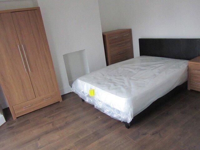 Property photo 2 of 10 A Neat And Tidy Single Bedroom Featuring A Wooden ...