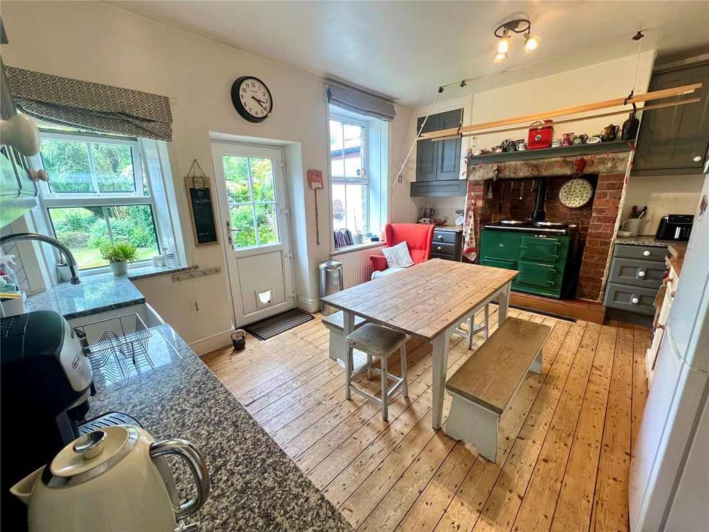 Property photo 2 of 14 Dining Kitchen