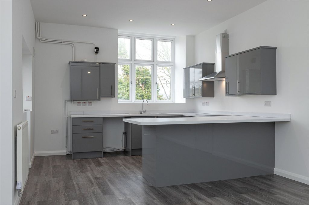 Property photo 3 of 8 Kitchen Area
