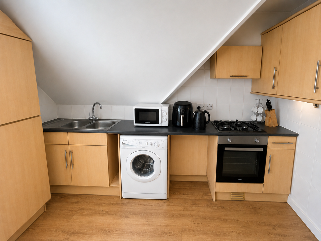 Property photo 3 of 7 Kitchen