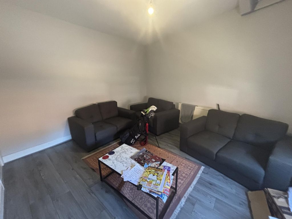 Property photo 1 of 13 A Spacious And Well-Maintained Living Room Featuri...