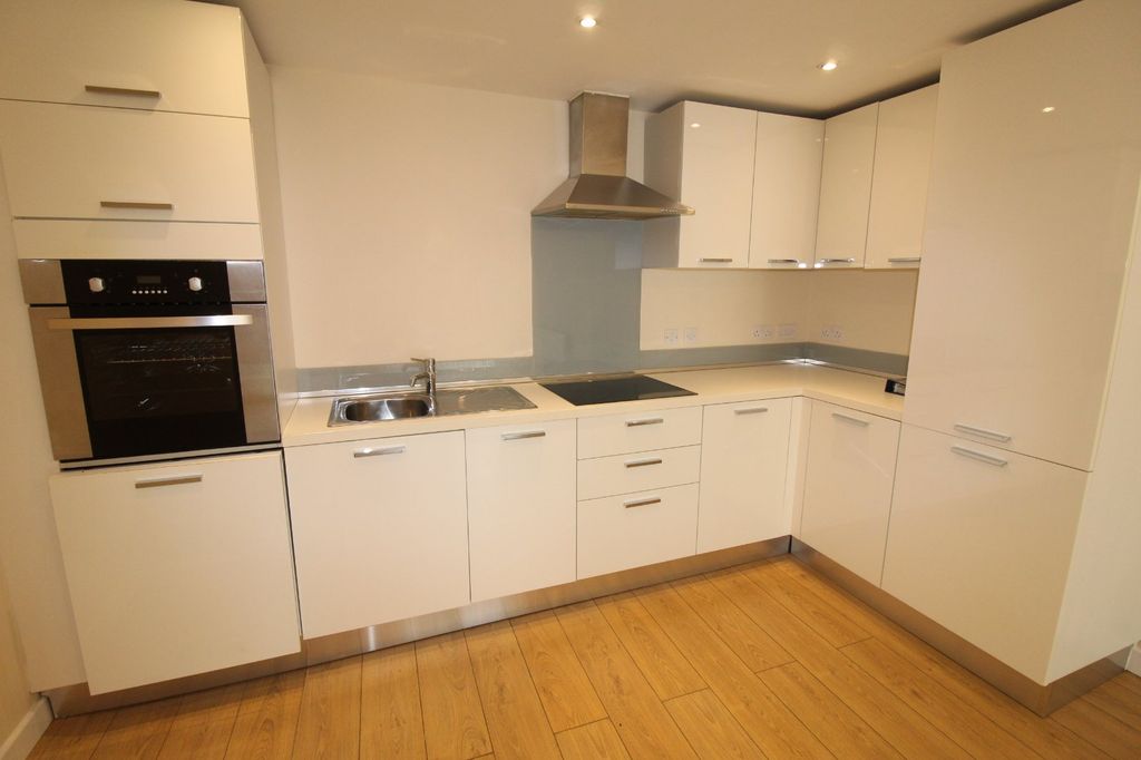 Property photo 3 of 7 Kitchen Area