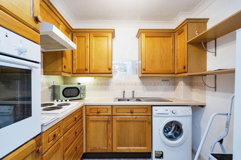 Property photo 3 of 13 Kitchen