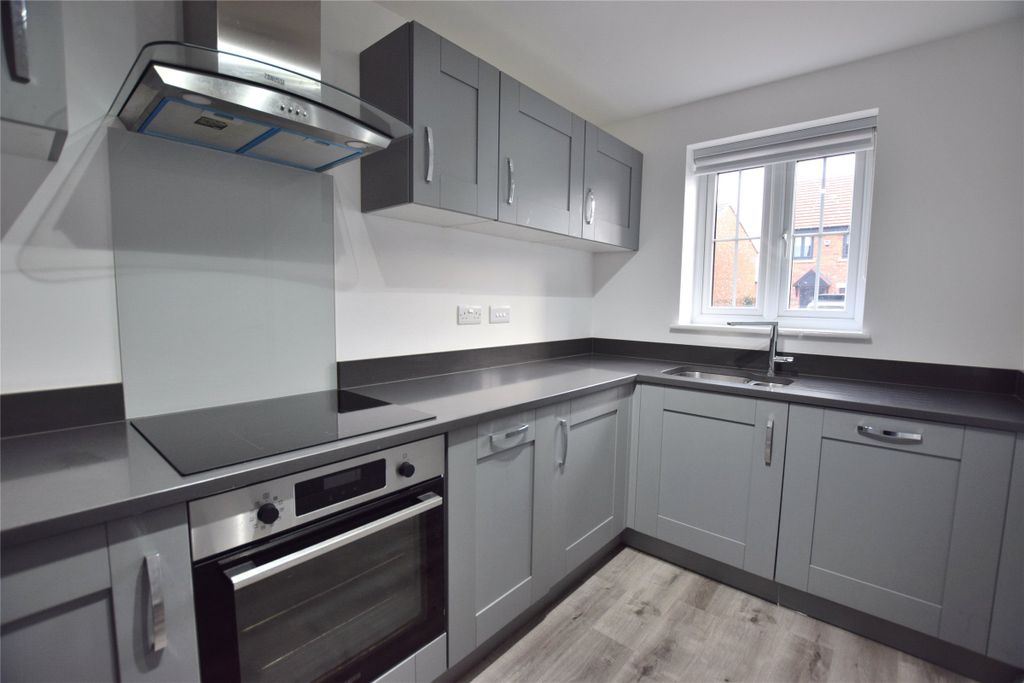 Property photo 3 of 12 Kitchen