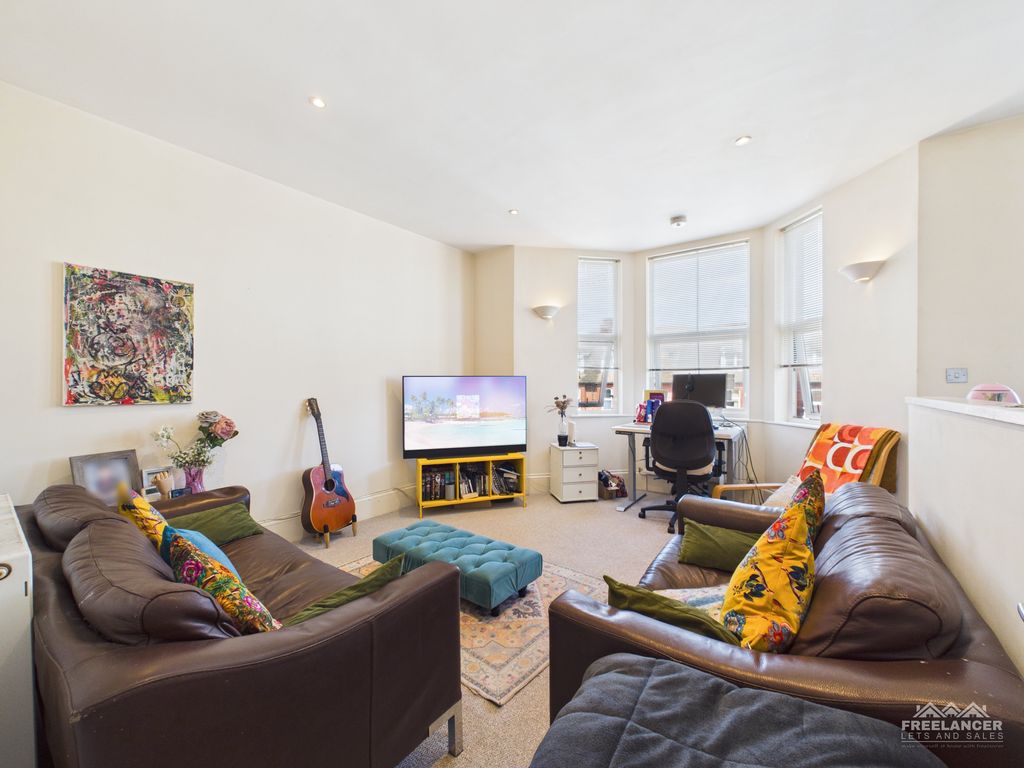 Property photo 2 of 8 Living Room