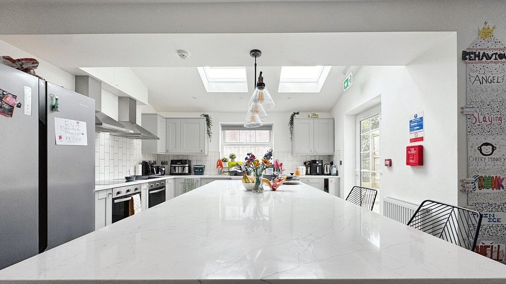 Property photo 1 of 15 Bright, Modern Communal Kitchen With A Long Centra...
