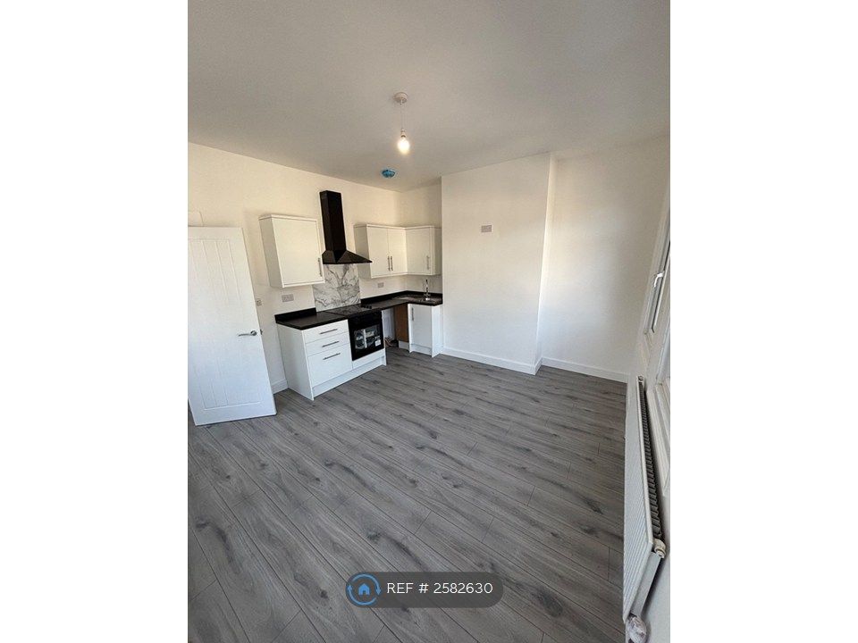 Property photo 1 of 10 Kitchen/Living Area