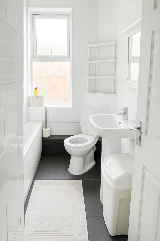 Property photo 2 of 8 Bright, Modern Bathroom With Clean White Tiling, A...
