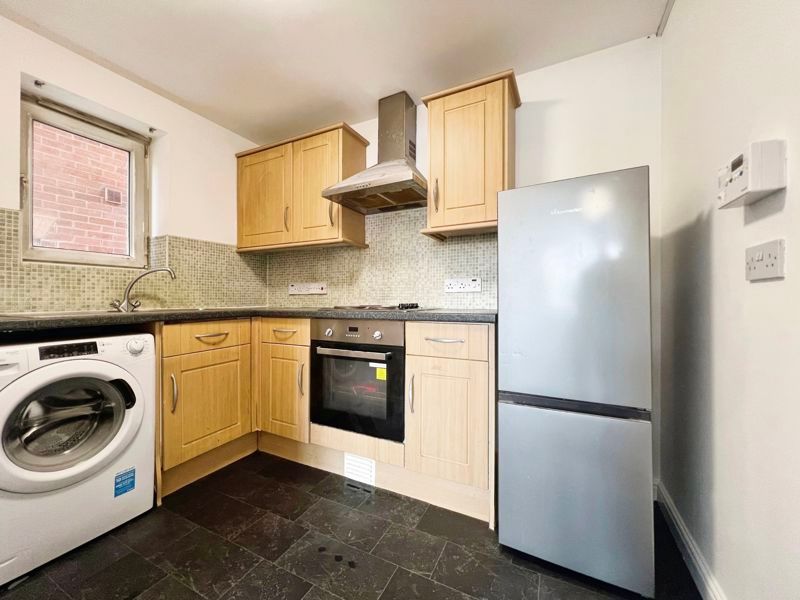 Property photo 3 of 9 Kitchen