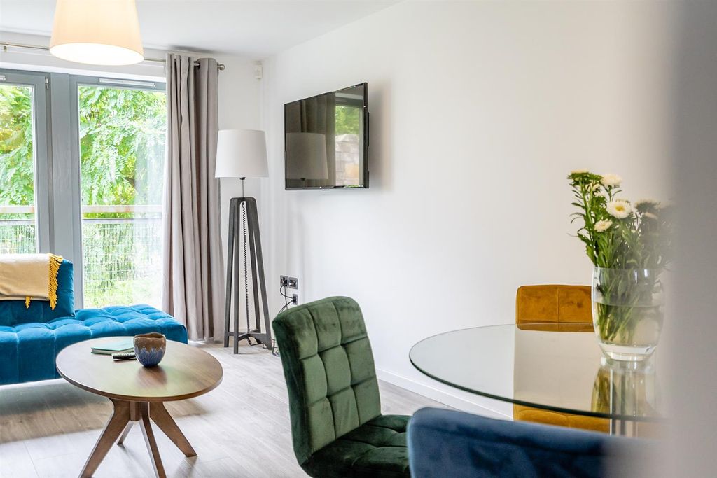 Property photo 3 of 11 Mcquades (12) Dining And Living.Jpg