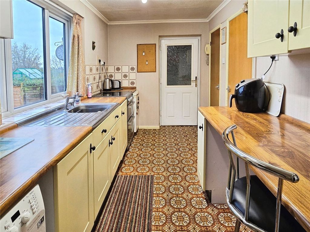 Property photo 3 of 13 Breakfast Kitchen