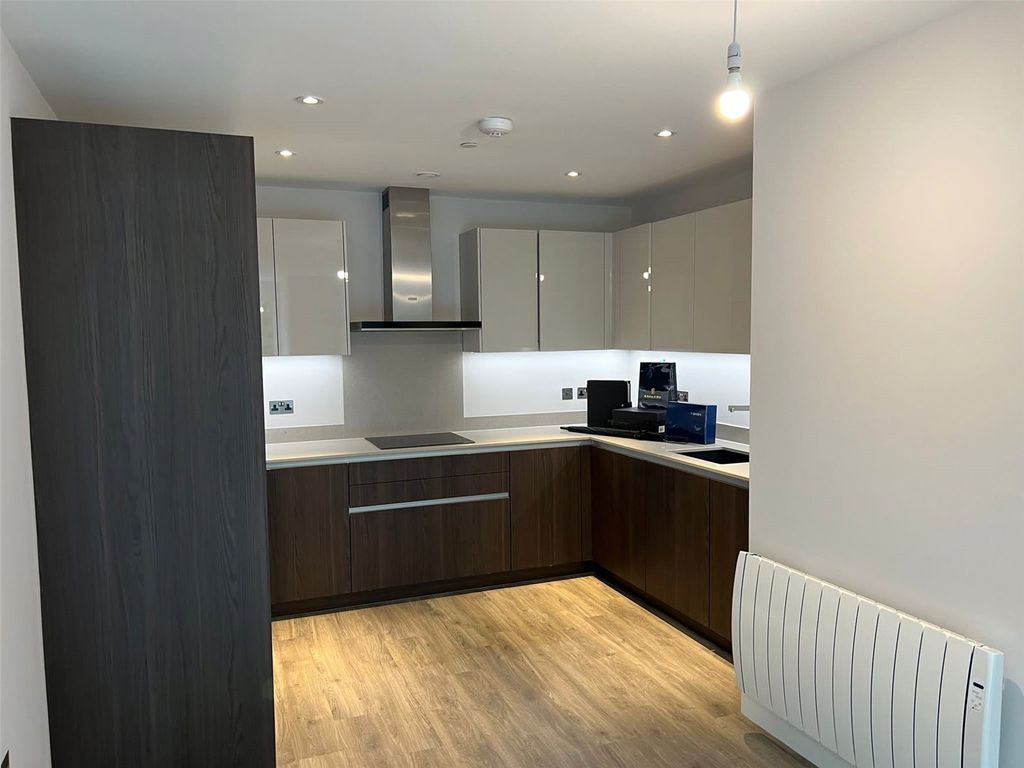 Property photo 3 of 12 Kitchen