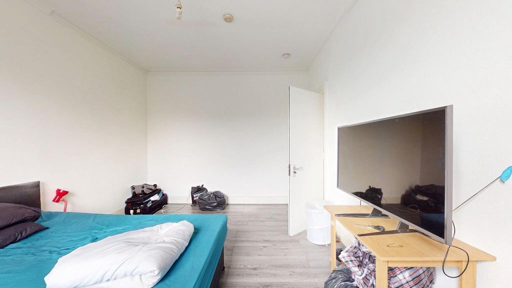 Property photo 1 of 14 Bright And Spacious Master Bedroom Featuring A Com...