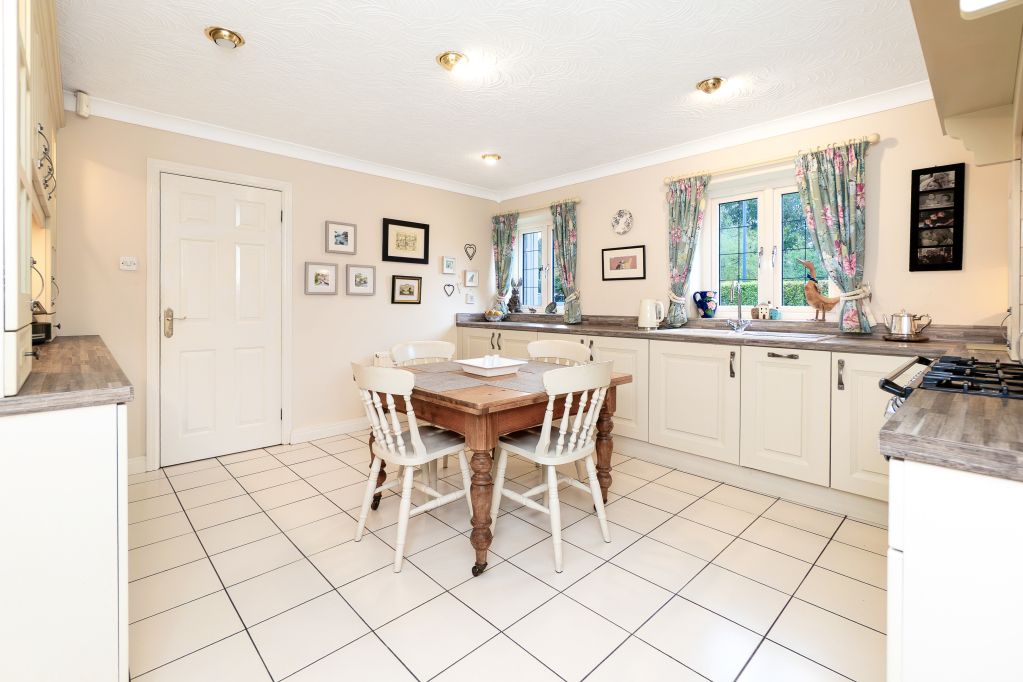 Property photo 3 of 24 Dining Kitchen