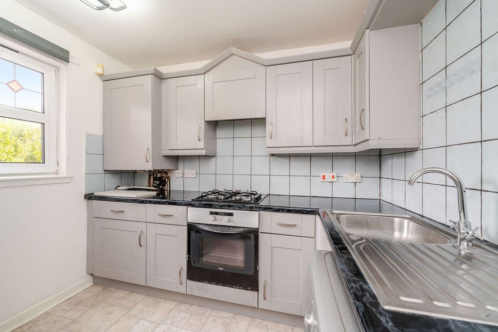 Property photo 3 of 13 Kitchen