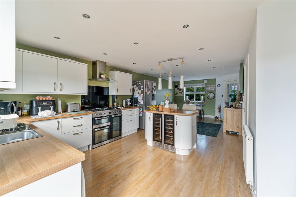 Property photo 3 of 19 Kitchen/Dining/Family