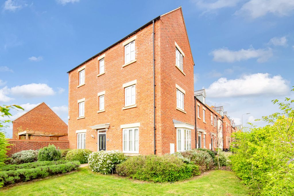 Property photo 2 of 24 Front/Side Elevations