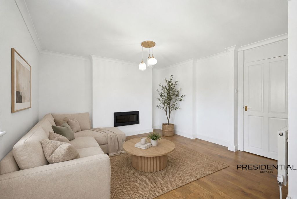 Property photo 3 of 16 Living Room - Staged Photo