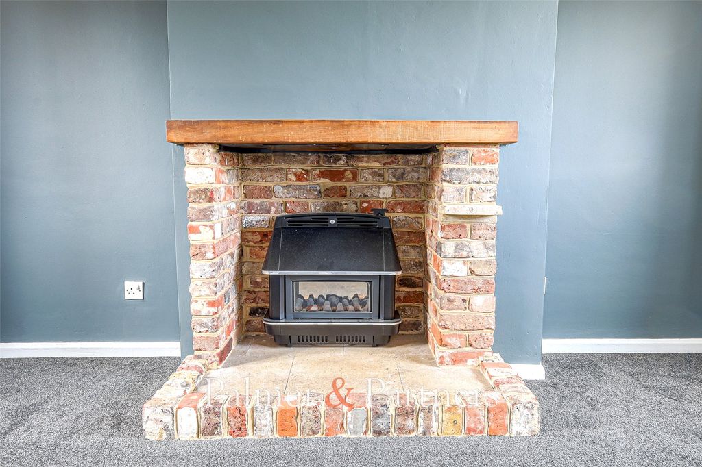 Property photo 3 of 12 Feature Fire Place