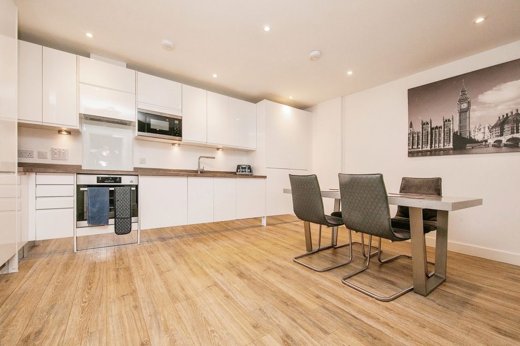 Property photo 3 of 8 Kitchen