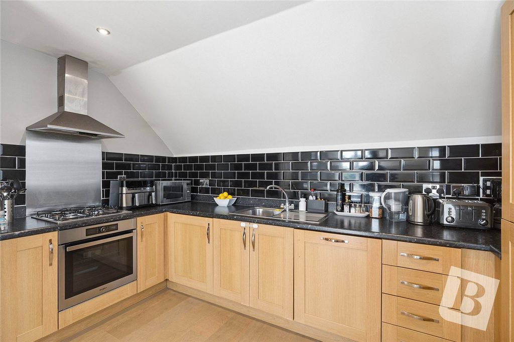 Property photo 2 of 12 Kitchen