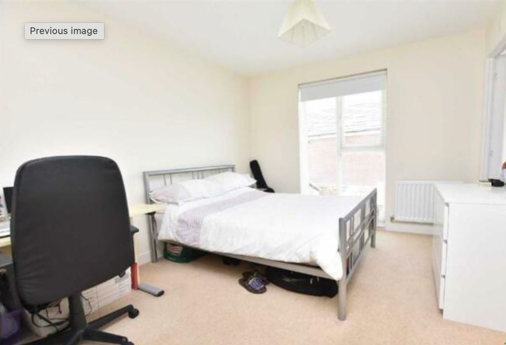 Property photo 2 of 9 Bright And Spacious Master Bedroom Featuring A Com...