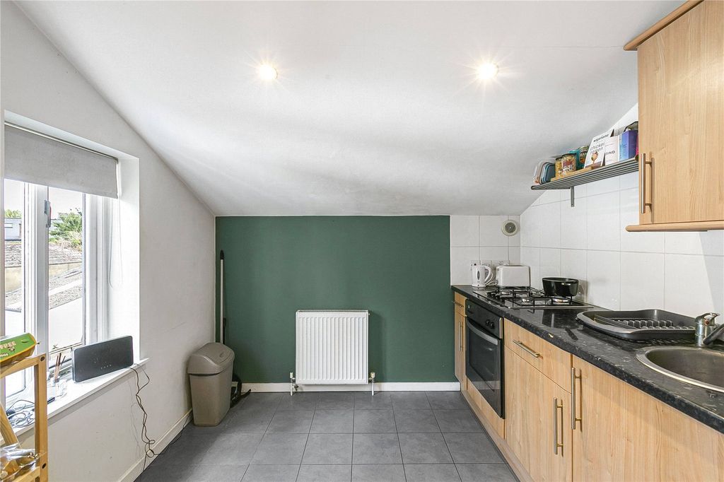 Property photo 3 of 12 Kitchen