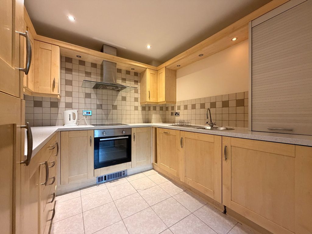 Property photo 3 of 12 Kitchen