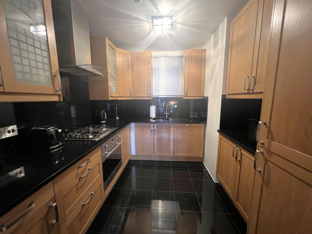 Property photo 3 of 6 Kitchen