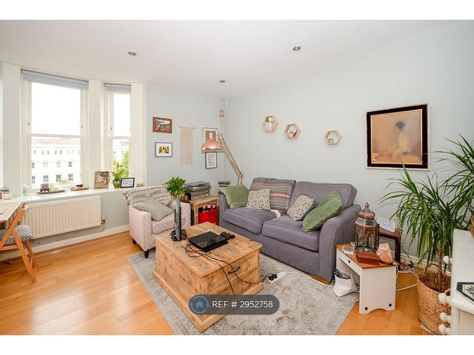 Property photo 1 of 8 Living Room With View Of Chinatown Arch.