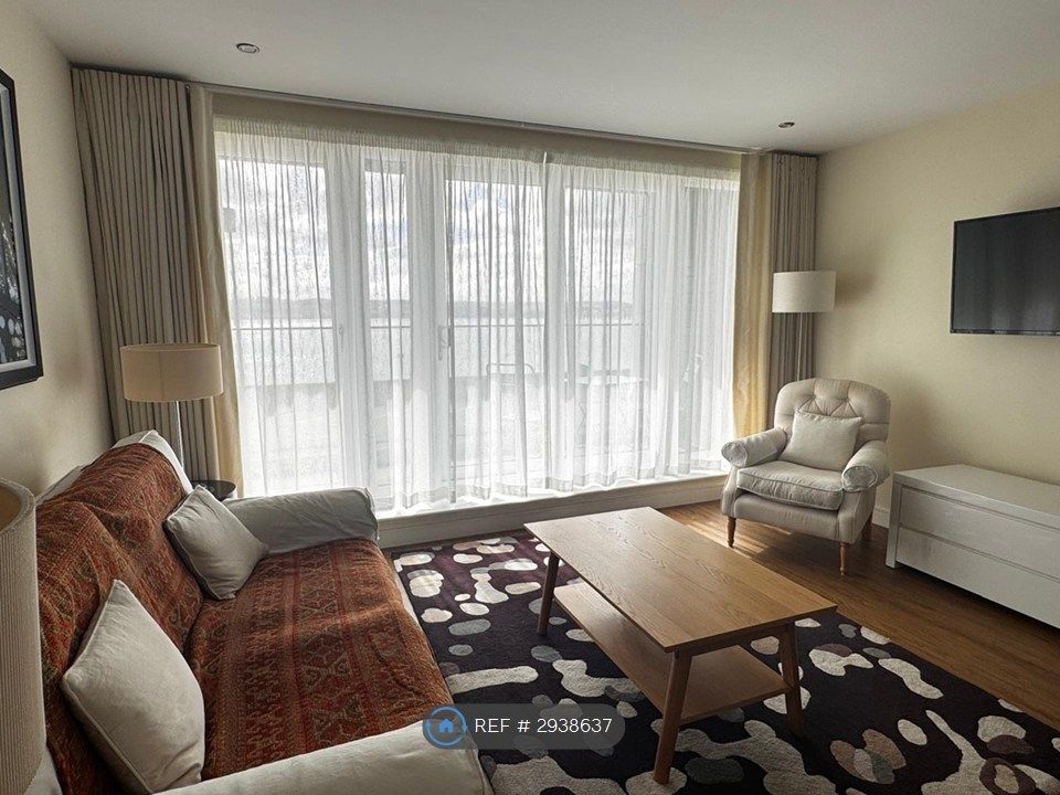 Property photo 3 of 9 Lounge & Balcony
