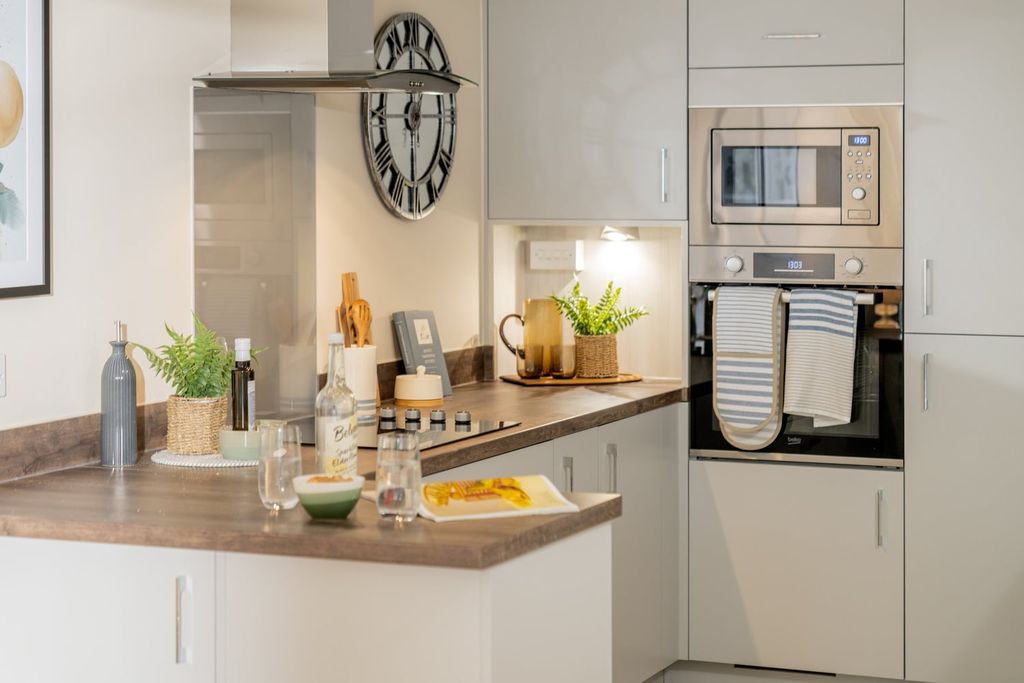 Property photo 1 of 12 Typical Kitchen