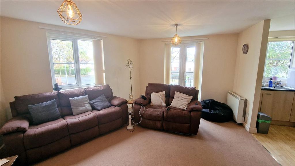 Property photo 2 of 8 Lounge With Balcony Access