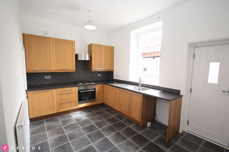 Property photo 3 of 13 Dining Kitchen