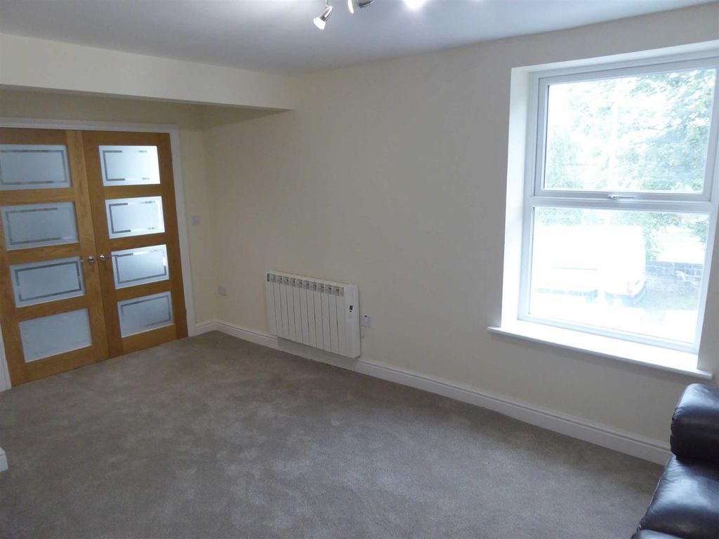 Property photo 3 of 9 Living Room: