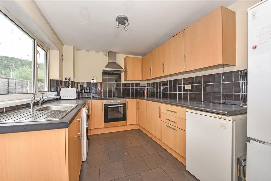 Property photo 2 of 14 Bright Kitchen With Ample Storage And Workspace...