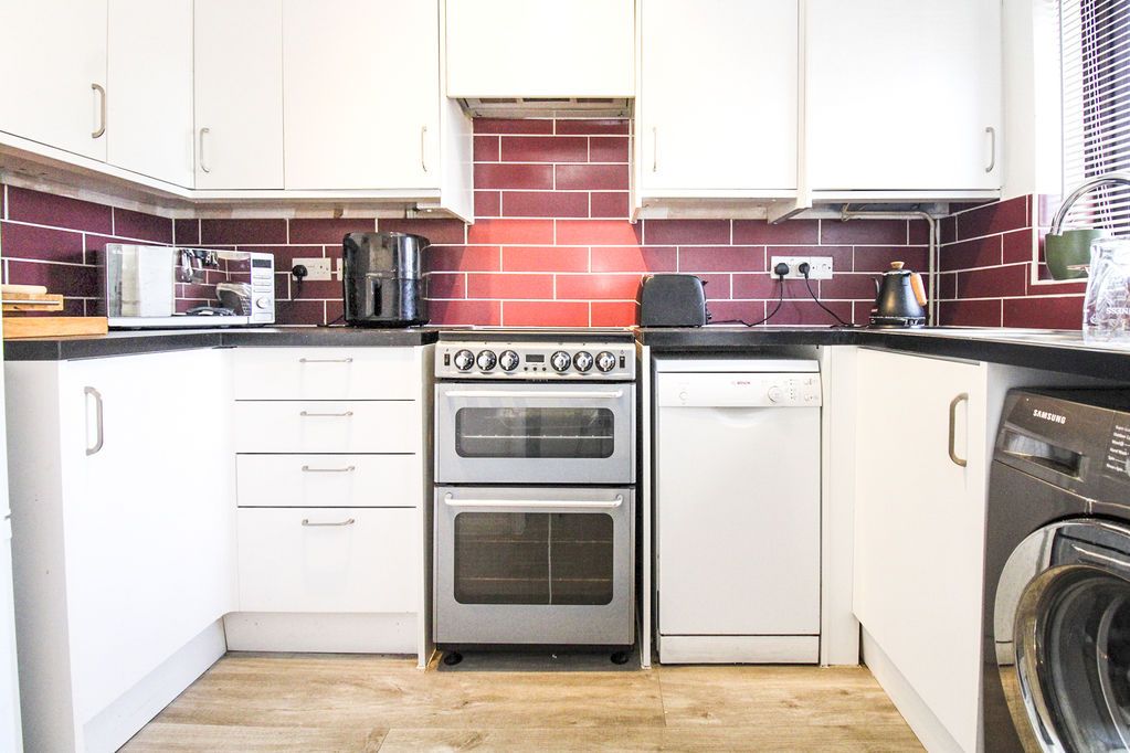 Property photo 2 of 12 Kitchen