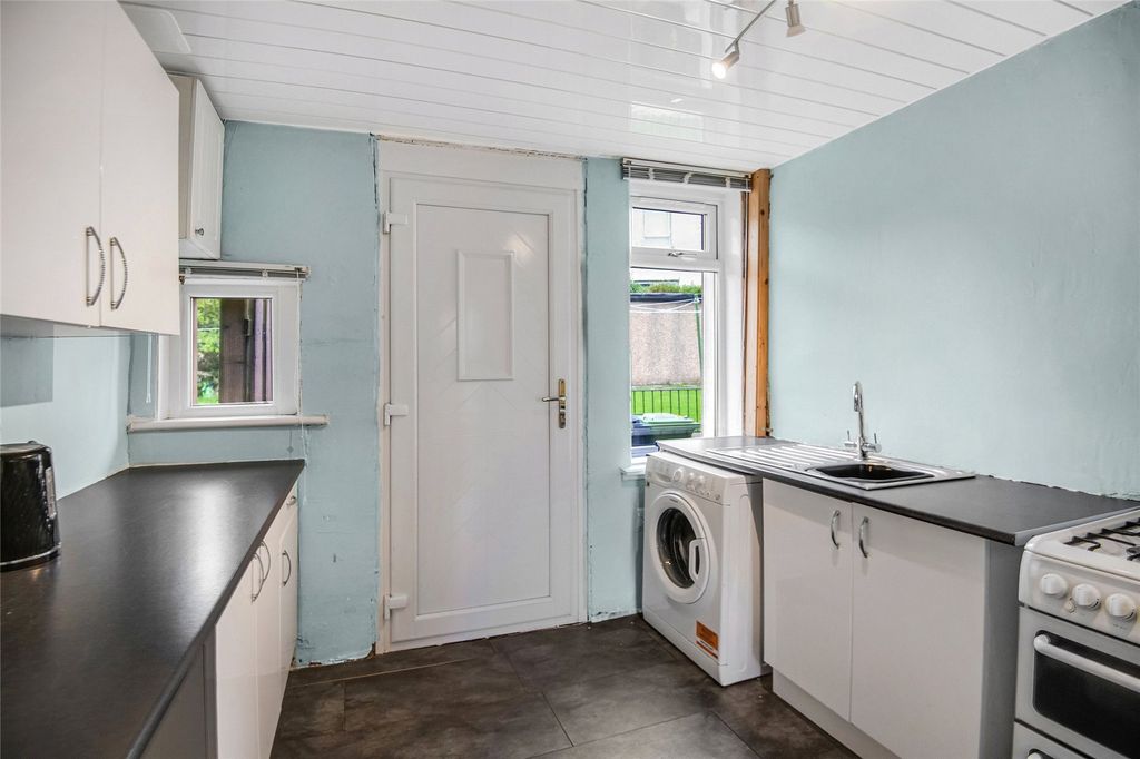 Property photo 3 of 13 Kitchen