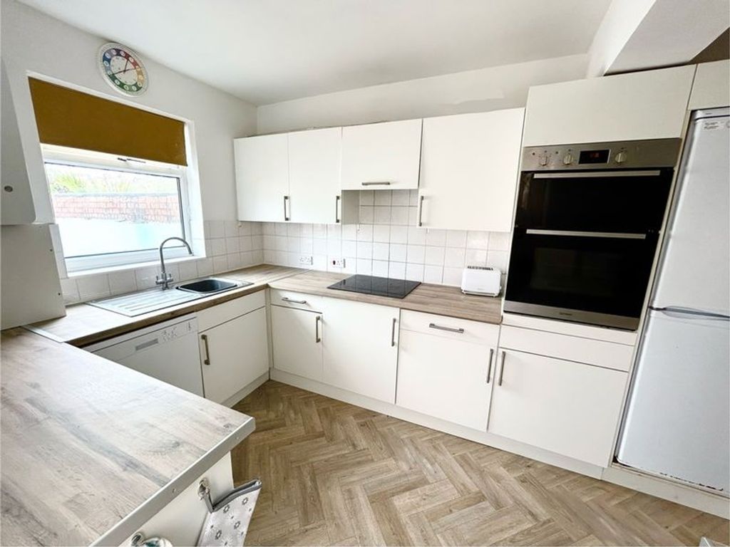 Property photo 1 of 5 A Modern And Tidy Kitchen Featuring Sleek Cabinetr...