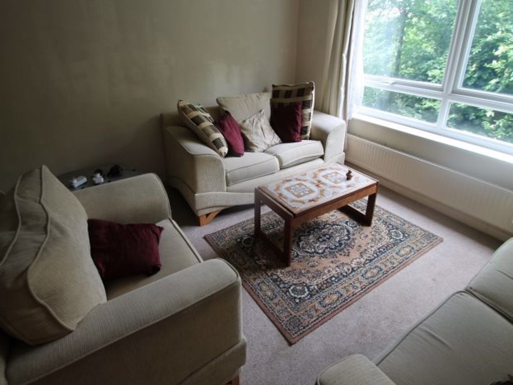 Property photo 1 of 6 A Bright And Spacious Living Room Featuring Large ...