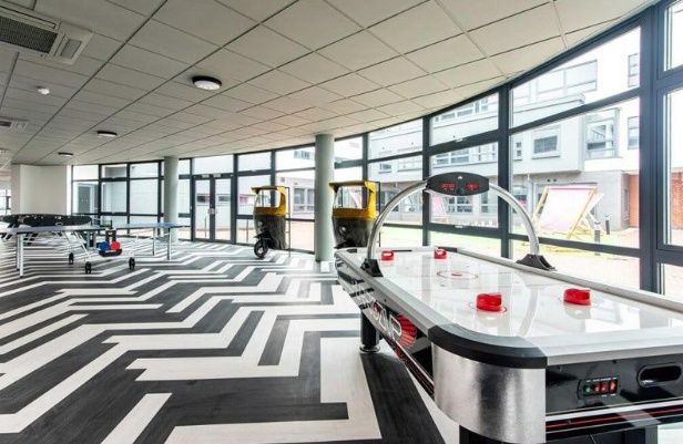 Property photo 3 of 6 Bright And Spacious Communal Lounge Featuring Mode...