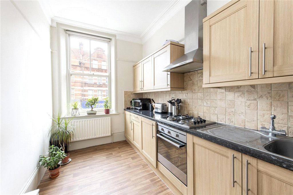 Property photo 3 of 7 Kitchen