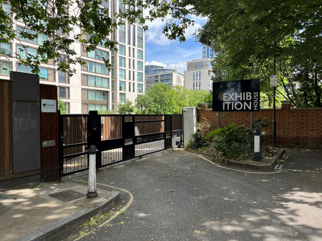 Property photo 1 of 11 Exhibition House_Sign And Gate.Jpg