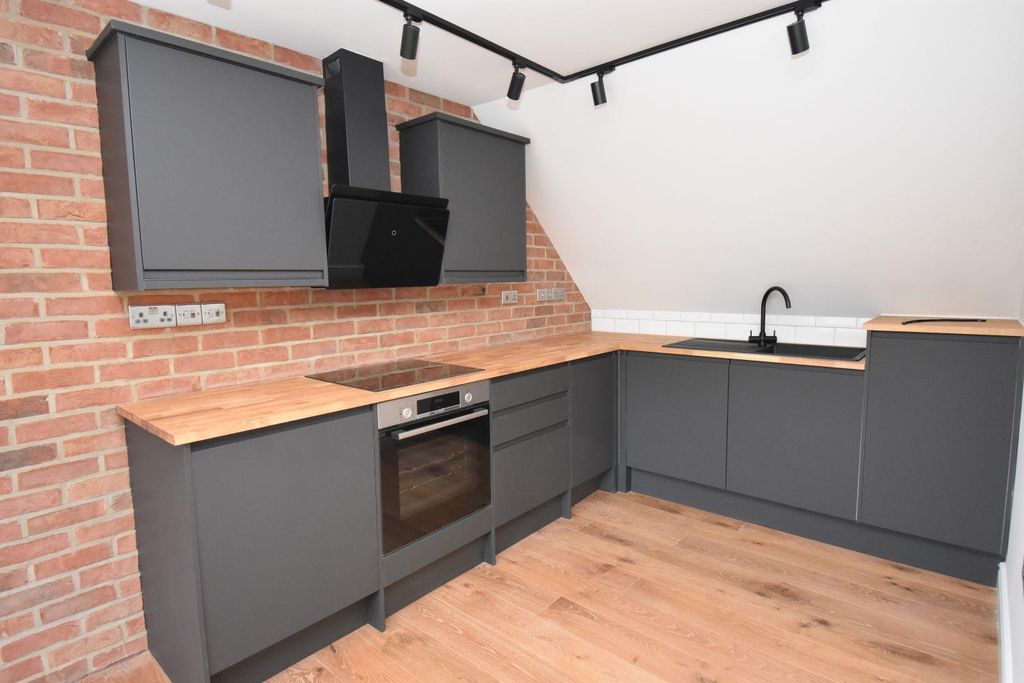 Property photo 3 of 6 7B Kitchen Area.Jpg