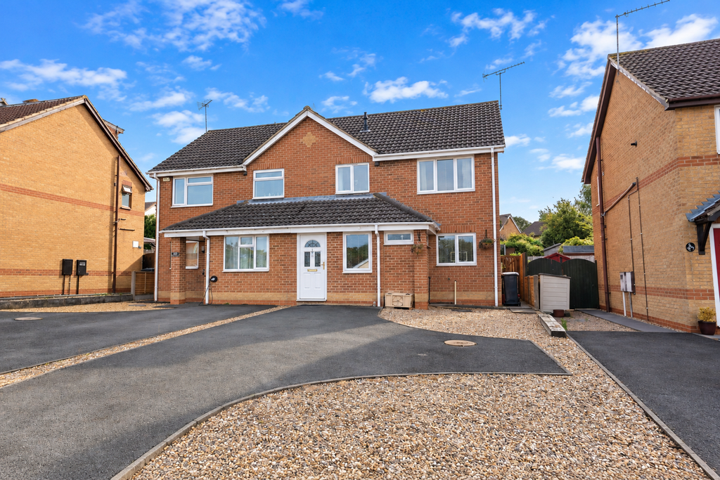 Property photo 1 of 21 Sunny Suburban Brick House Exterior