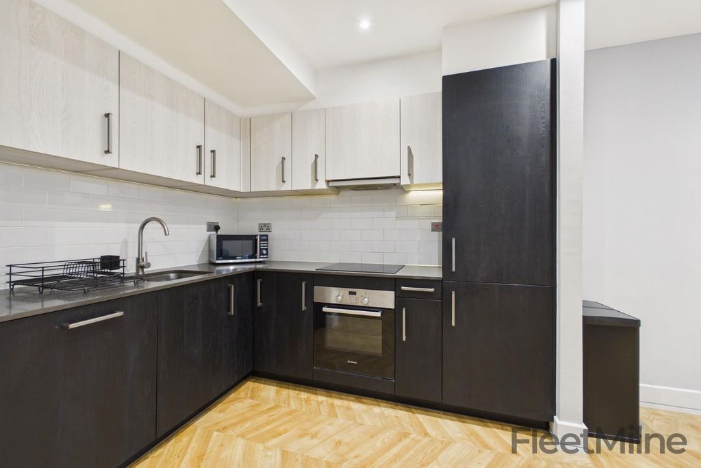 Property photo 3 of 12 Kitchen