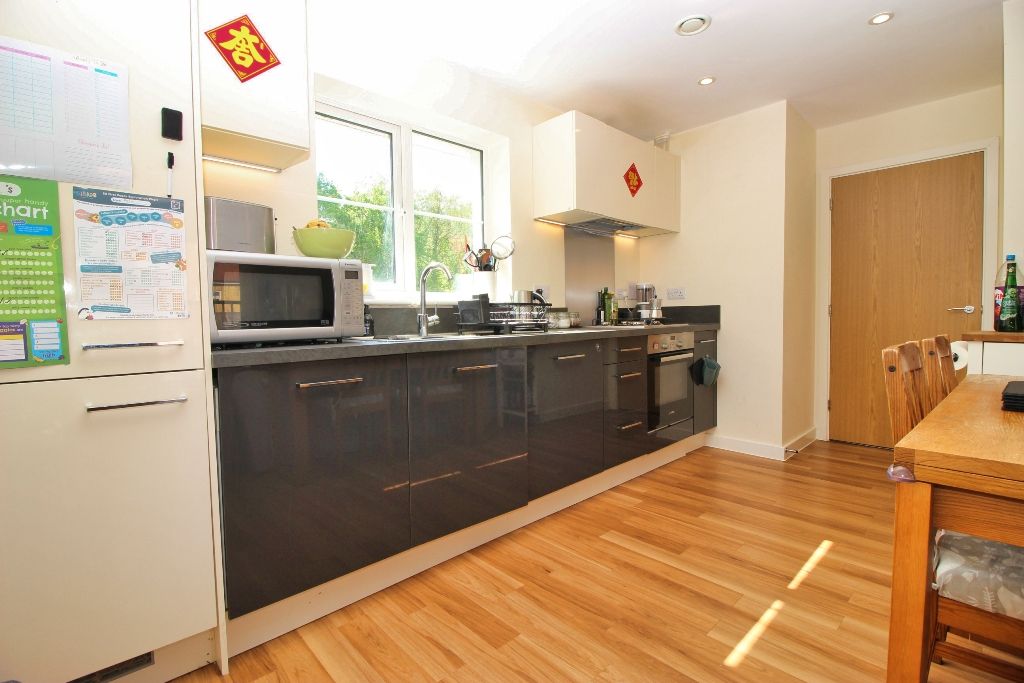 Property photo 3 of 13 Kitchen/Living Area