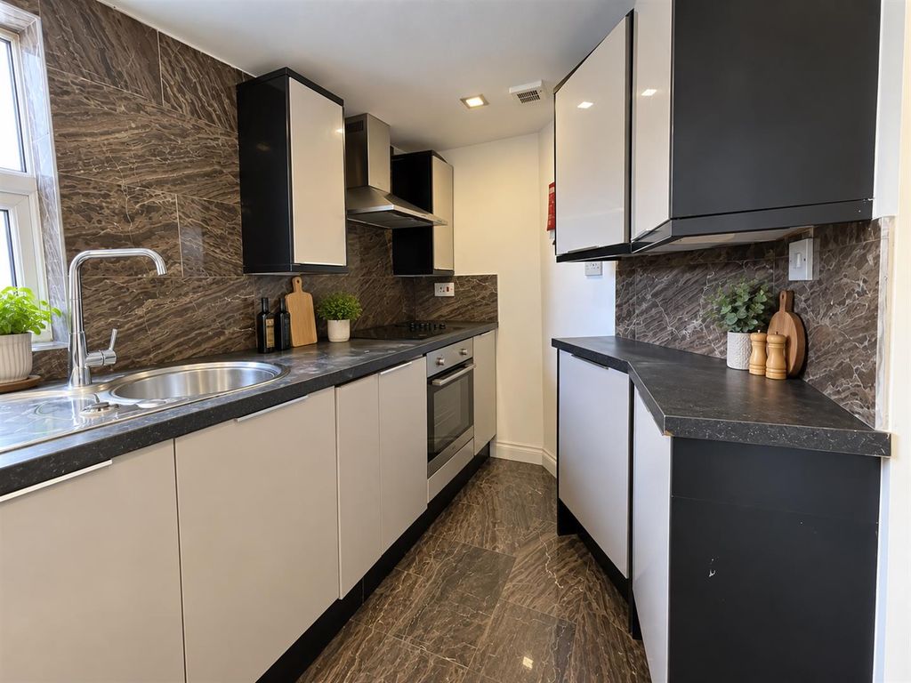 Property photo 3 of 12 Kitchen Ai 2.Png